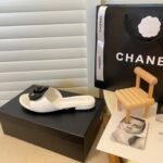Chanel Black Camellia Slides White - Image 7
