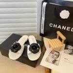 Chanel Black Camellia Slides White - Image 2